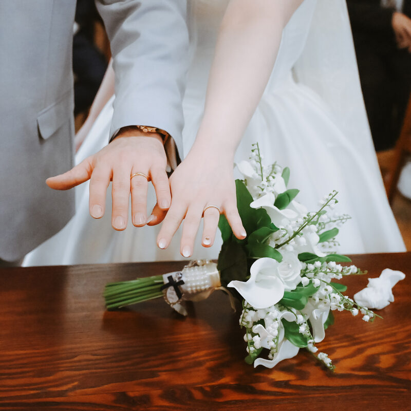 Wedding rings and bouquet
